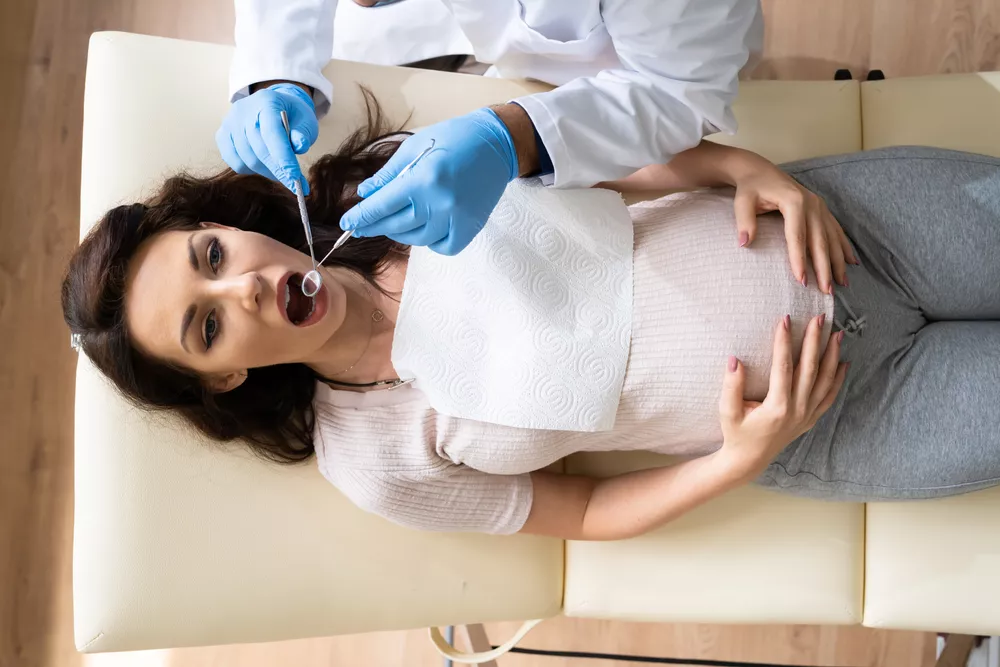 Can I have a dental implant implanted during pregnancy 1